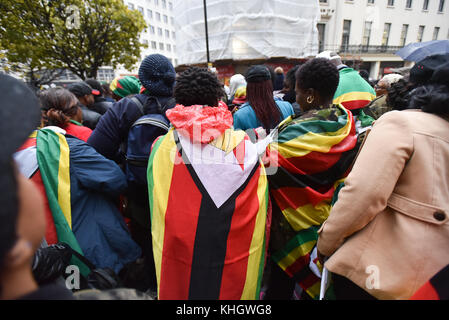 Strand, London, UK. 18th November 2017 Zimbabweans stage a large protest outside the Zimbabwe embassy against Robert Mugabe. Credit: Matthew Chattle/Alamy Live News Stock Photo