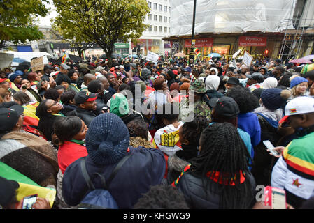 Strand, London, UK. 18th November 2017 Zimbabweans stage a large protest outside the Zimbabwe embassy against Robert Mugabe. Credit: Matthew Chattle/Alamy Live News Stock Photo