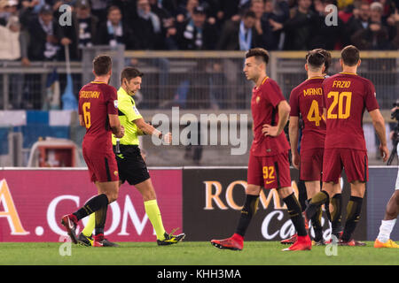 Rome, Italy. 18th Nov, 2017. Gianluca Rocchi (Referee) Football/Soccer : Referee Gianluca Rocchi gives a penalty to Lazio after checking the VAR (video assistant referee) monitor during the Italian 'Serie A' match between AS Roma 2-1 SS Lazio at Stadio Olimpico in Rome, Italy . Credit: Maurizio Borsari/AFLO/Alamy Live News Stock Photo