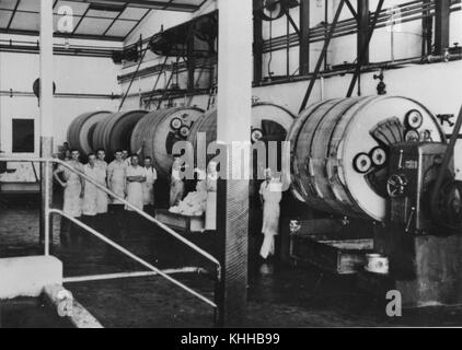 1 205388 Workers inside the churn room of the butter factory, Kingaroy, 1938 Stock Photo