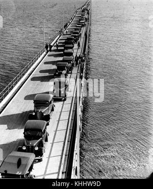 2 166027 Aerial view of cars and pedestrians on the Hornibrook Highway Bridge, Redcliffe, 1935 Stock Photo