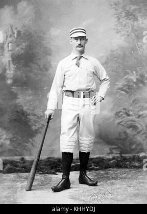 Picture of 19th century unidentified baseball player standing with bat, by Gilbert Bacon, Philadelphia, 1900. From the New York Public Library. Stock Photo