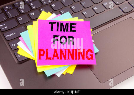 Time For Planning writing text made in the office close-up on laptop computer keyboard. Business concept for Love Business Time on the black backgroun Stock Photo