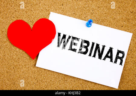 Hand writing text caption inspiration showing Webinar concept meaning Love Online Training Development Business Workshop written on sticky note, remin Stock Photo