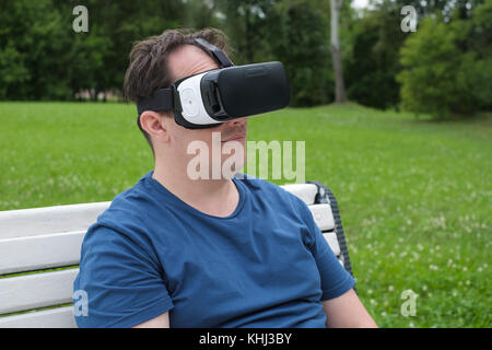 Man using virtual reality glasses Stock Photo