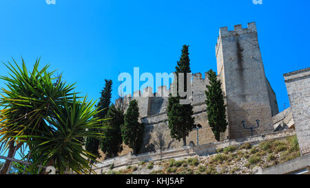 Small picturesque medieval town Oria fortress wall and tower view, Brindisi region, Puglia, Italy. Stock Photo