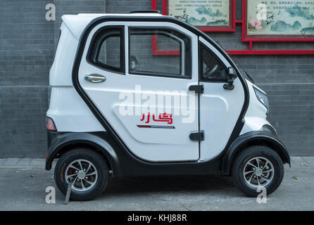 Unlicensed mini electric car is seen in Beijing, China. Stock Photo