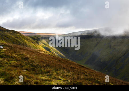 Swirling Clouds and High Cup Nick from the Pennine Way Footpath, Cumbria, UK Stock Photo