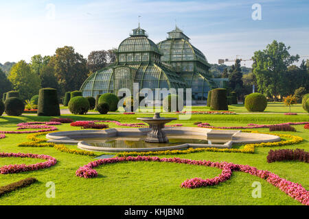 VIENNA, AUSTRIA - SEPTEMBER 11, 2016 : View of Palm House in Schönbrunn Palace Garden in Vienna, on bright sky background. It was built in 1883 and ha Stock Photo