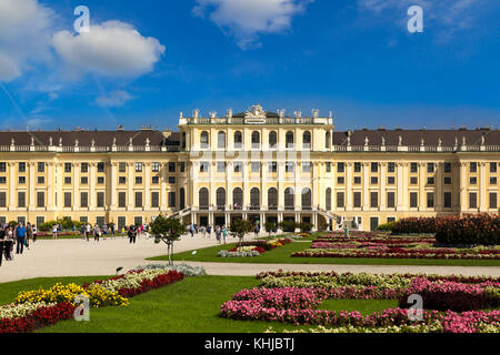 VIENNA, AUSTRIA - SEPTEMBER 11, 2016 : View of Schönbrunn Palace, one of best touristic attractions in Vienna on bright sky background. It is baroque  Stock Photo