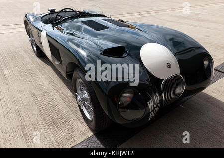 Three-quarter front view of a Jaguar C-Type  in the International Paddock, at the 2017 Silverstone Classic Stock Photo