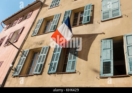 Sailboat with bright red fenders docked in port. Stock Photo