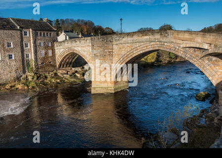 County Bridge over the River Tees at Barnard Castle, County Durham, North East England, UK in late autumn bright sunshine under a clear blue sky Stock Photo