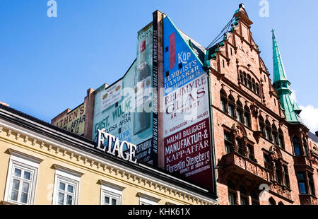 vintage advertising on rooftops in Stortorget, a large plaza in the centre of Malmo, Sweden Stock Photo