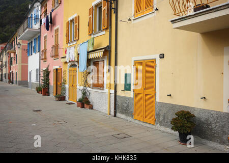 beautifully brightly colored seafront houses in Liguria Italy Stock Photo