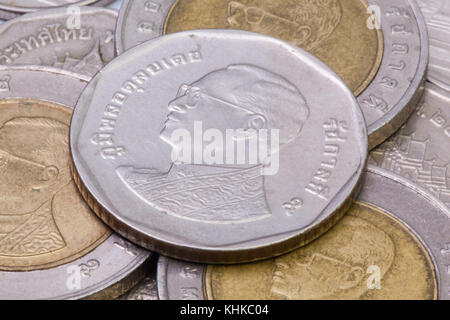 Detail of different Thai coins on the table. Stock Photo