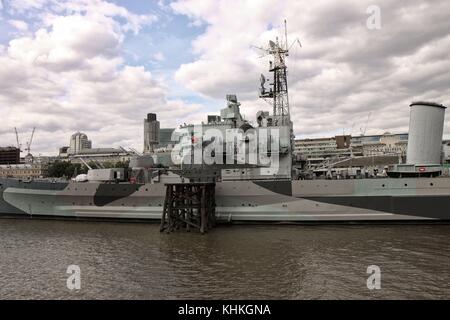 HMS Belfast - HMS Belfast is a museum ship, originally a light cruiser built for the Royal Navy, currently moored on the River Thames in London Stock Photo