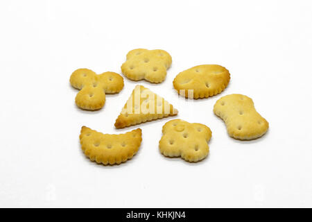 Delicious small salty crackers of different shapes. Stock Photo