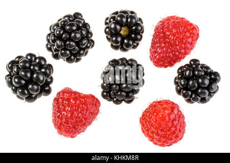 Group of delicious juicy blackberries and raspberries. Collection of individual forest fruits isolated on white background. Stock Photo