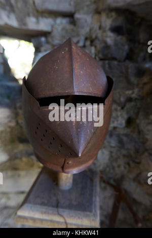 Suite of armour on display in Castello di Vezio watchtower, Varenna, Lecco Lombardy, Italy. Stock Photo