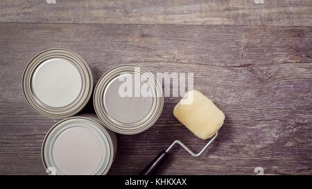 Home inprovement project. Painting wood with turquose color paint. Stock Photo