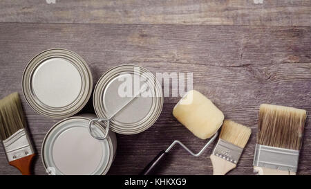 Home inprovement project. Painting wood with turquose color paint. Stock Photo