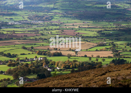 Far reaching patchwork landscape in the Vale of Clywd in autumn. View from the Clwydian range near Llanbedr Dyffryn Clwyd, North Wales. Stock Photo