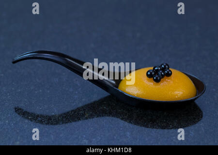 Mini canap with elements of molecular kitchen on white background Stock Photo