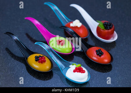 Mini canap with elements of molecular kitchen on white background Stock Photo