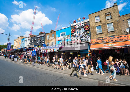 LONDON - JUNE 18, 2017: People exploring the bustling Camden Market area of London on sunny summer's day. Stock Photo