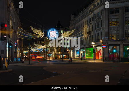 LONDON - NOVEMBER 18, 2017: Christmas lights on Oxford Circus, London, UK. The Christmas lights attract thousands of shoppers during the festive seaso Stock Photo