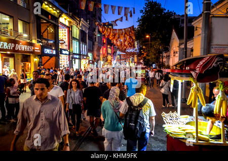 Pedestrianised İstiklal Caddesi (Independence Street) a bustling modern shopping street in Istanbul, Turkey on August 13, 2015. Stock Photo