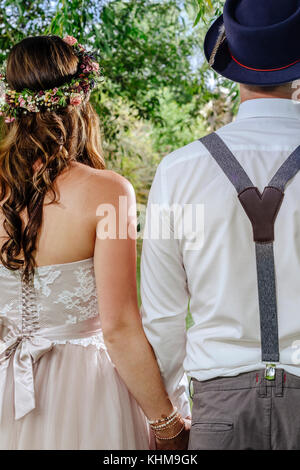 Cropped photo of a beautiful couple from behind on their wedding day. Stock Photo