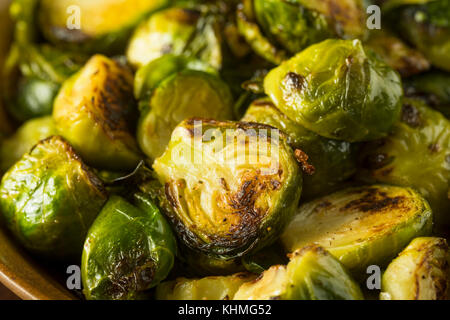 Homemade Roasted Green Brussel Sprouts in a Bowl Stock Photo