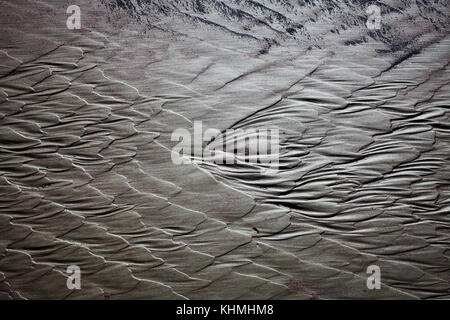 Sights along the beach in a secluded Bay, South Island, New Zealand: patterns in the sand. Stock Photo