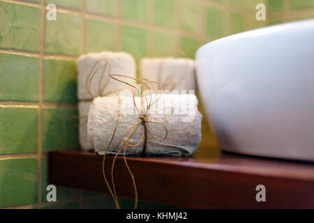 closeup of towels with rope in a luxury  bathroom Stock Photo