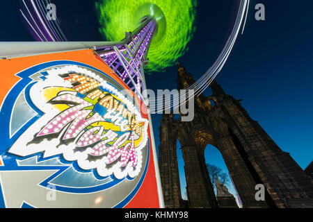 Edinburgh, Scotland, UK. 18th November, 2017. The Star Flyer ride in Princes Street Gardens gives a spectacular view of the city with its position next to the Scott Monument in Princes Street Gardens.  Edinburgh's Christmas is open from 18 November 2017 to 6 January 2018 Credit: Rich Dyson/Alamy Live News Stock Photo