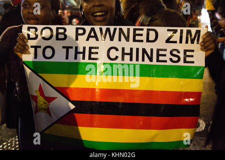 London Uk 18th November 2017 People gathered at the Zimbabwe House in London during a rally calling on President  Robert Mugabe  to step down. Stock Photo