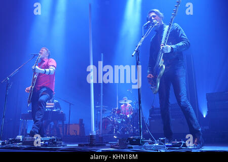 London, UK. 18th Nov, 2017. Josh Homme (left) and Michael Shuman of Queens of the Stone Age performing live on stage at Wembley Arena in London. Photo date: Saturday, November 18, 2017. Credit: Roger Garfield/Alamy Live News Stock Photo