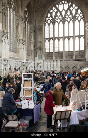 Ely Cathedral, Ely, UK. 18th Nov, 2017. People attending the Ely Cathedral Christmas Gift & Food Fair, a popular Christmas market with several stalls set up in the iconic cathedral. Credit: Nicola Ferrari/Alamy Live News Stock Photo