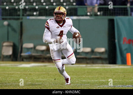 Fenway Park. 18th Nov, 2017. MA, USA; Boston College Eagles quarterback Darius Wade (4) runs with the ball during the NCAA football game between Boston College Eagles and UConn Huskies at Fenway Park. Boston College defeated UConn 39-16. Anthony Nesmith/CSM/Alamy Live News Stock Photo