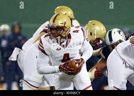 Fenway Park. 18th Nov, 2017. MA, USA; Boston College Eagles quarterback Darius Wade (4) rolls out of the pocket during the NCAA football game between Boston College Eagles and UConn Huskies at Fenway Park. Boston College defeated UConn 39-16. Anthony Nesmith/CSM/Alamy Live News Stock Photo