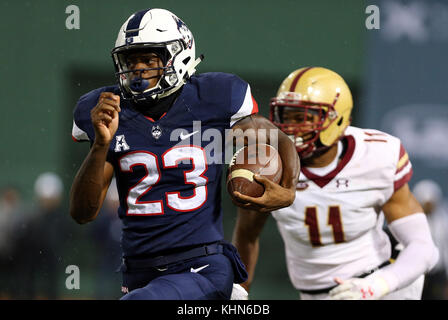 Fenway Park. 18th Nov, 2017. MA, USA; UConn Huskies wide receiver Keyion Dixon (23) runs with the ball during the NCAA football game between Boston College Eagles and UConn Huskies at Fenway Park. Boston College defeated UConn 39-16. Anthony Nesmith/CSM/Alamy Live News Stock Photo