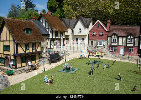 Playground and houses Bekonscot Model Village Beaconsfield Buckinghamshire England Stock Photo