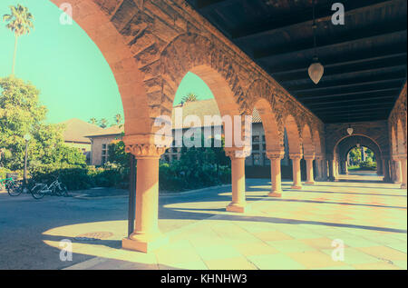 the architectural structures of the hallway at Stanford University campus in Palo Alto, California, USA. Filter processed. Stock Photo