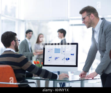 two businessmen analyzing stats financial data Stock Photo
