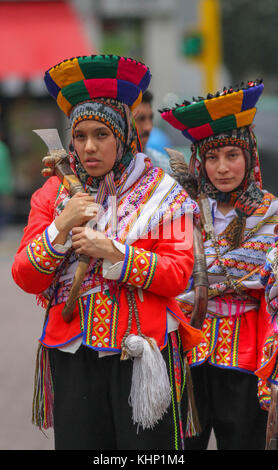 Women in costume at a street carnival in Lima, Peru Stock Photo