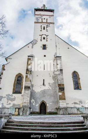 Basilica of the Holy Cross in Kezmarok city, Slovak republic. Religious architecture. Travel destination. Stock Photo