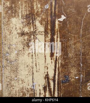 Textured, scratched background/backdrop of dark brown and cream wall Stock Photo