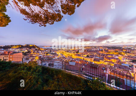 City View of Lisbon after sunset from Belvedere of Our Lady of the Mount or Miradouro da Nossa Senhora do Monte Stock Photo